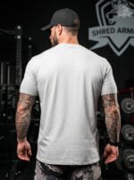 tryon_16_Warrior_T_Shirt_Mockup_Light_Gray_Mockup_Back_the_person_is_standi